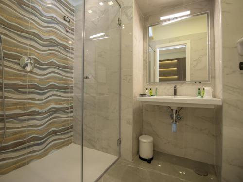 Habitación Triple del hotel Palazzo Firenze. Foto 1