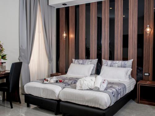Habitación Doble Deluxe con Balcón del hotel Palazzo Firenze. Foto 2
