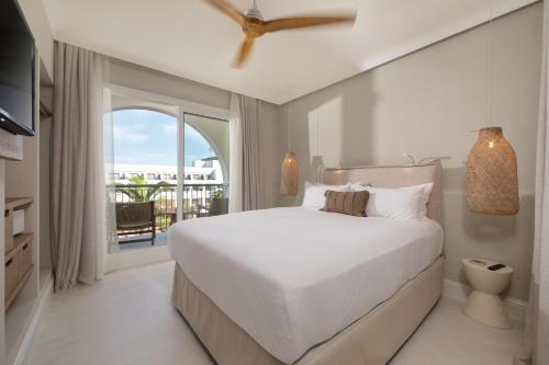Suite Junior con vistas laterales al mar del hotel Daia Conil Slow Beach Hotel - Adults Only Recommended. Foto 2