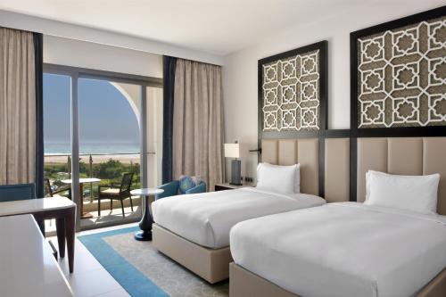 Deluxe Twin Room with Two Twin Beds and Ocean View del hotel Hilton Tangier Al Houara Resort and Spa. Foto 7