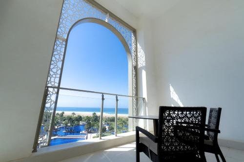 Deluxe Twin Room with Two Twin Beds and Ocean View del hotel Hilton Tangier Al Houara Resort and Spa. Foto 9