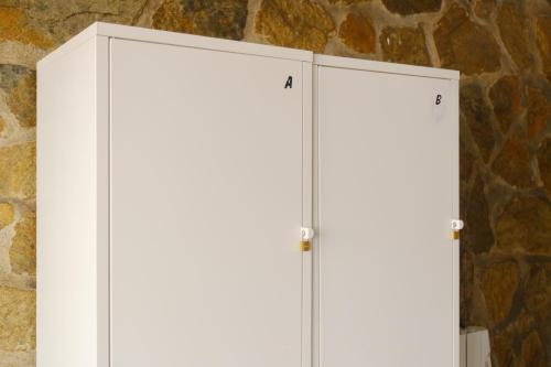 Cama individual en habitación compartida - 4 camas del hotel La Palma Hostel - Pensión Central. Foto 6