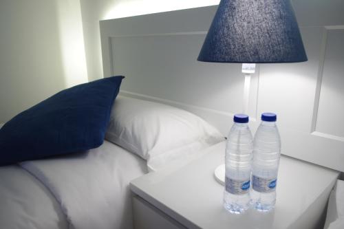 Habitación Doble con baño privado externo - 2 camas del hotel Magma Rooms. Foto 3