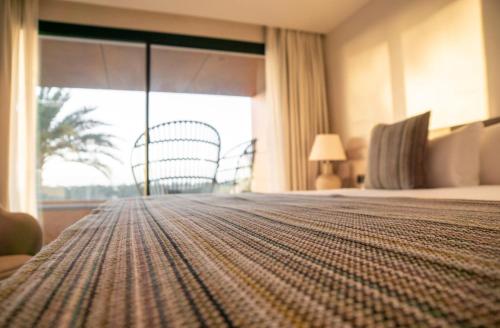 Habitación Doble Deluxe con vistas al mar del hotel TenSuites. Foto 6