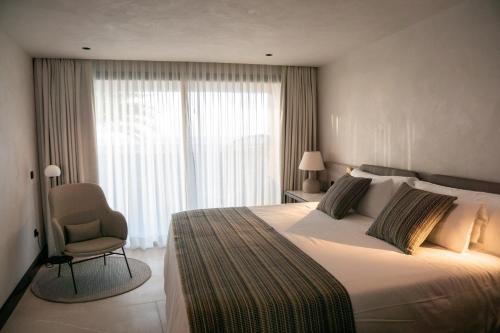 Habitación Doble Deluxe con vistas al mar del hotel TenSuites. Foto 22