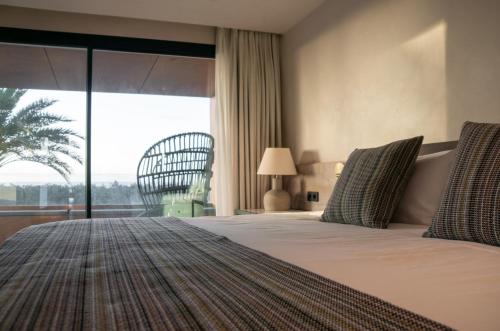 Habitación Doble Deluxe con vistas al mar del hotel TenSuites. Foto 26