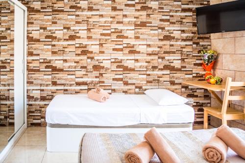 Habitación Doble con balcón (2 adultos + 1 niño) del hotel Poseidón. Foto 5