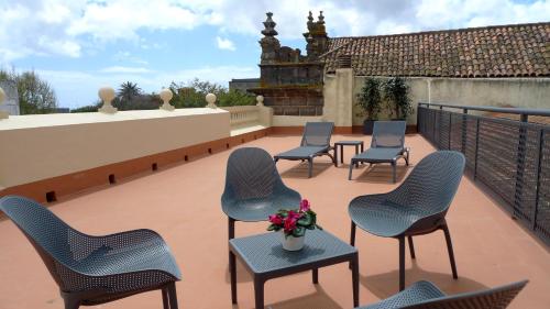Suite con terraza del hotel Nava Suites. Foto 1