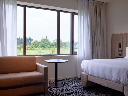 Suite Junior - Lado de la montaña del hotel Tribe Milano Malpensa. Foto 4