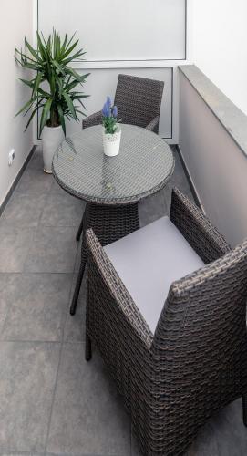 Habitación Doble con balcón del hotel La Palmera Hotel Boutique. Foto 4