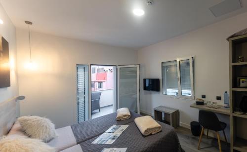 Habitación Doble con balcón del hotel La Palmera Hotel Boutique. Foto 5