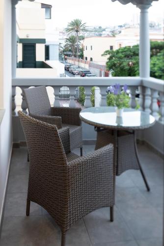 Habitación Doble Deluxe con balcón del hotel La Palmera Hotel Boutique. Foto 2