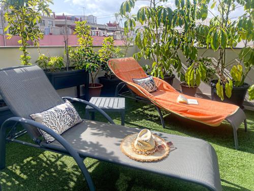 Suite con terraza del hotel La Palmera Hotel Boutique. Foto 3