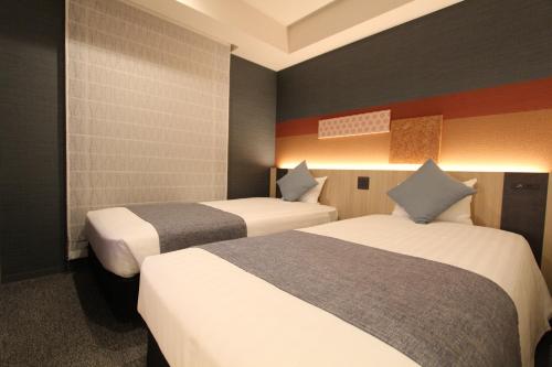 Habitación Doble Estándar - 2 camas del hotel KOKO Tsukiji Ginza