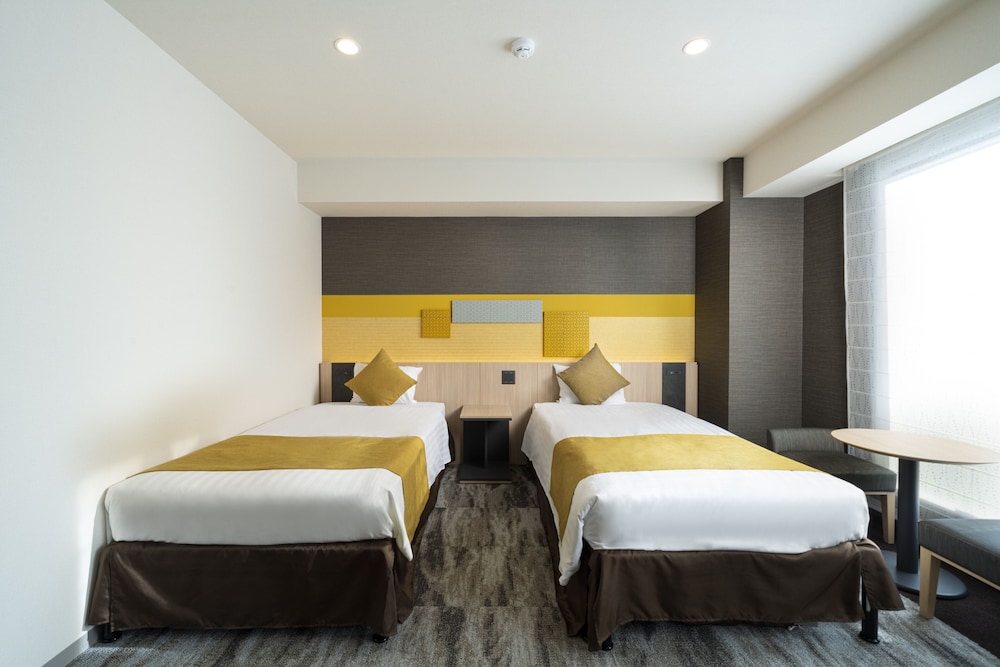Habitación familiar con 2 camas individuales, no fumadores del hotel KOKO Tsukiji Ginza. Foto 2