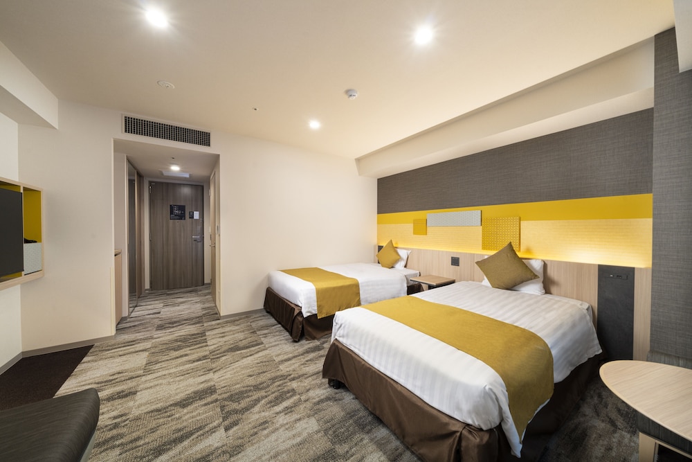 Habitación familiar con 2 camas individuales, no fumadores del hotel KOKO Tsukiji Ginza. Foto 3
