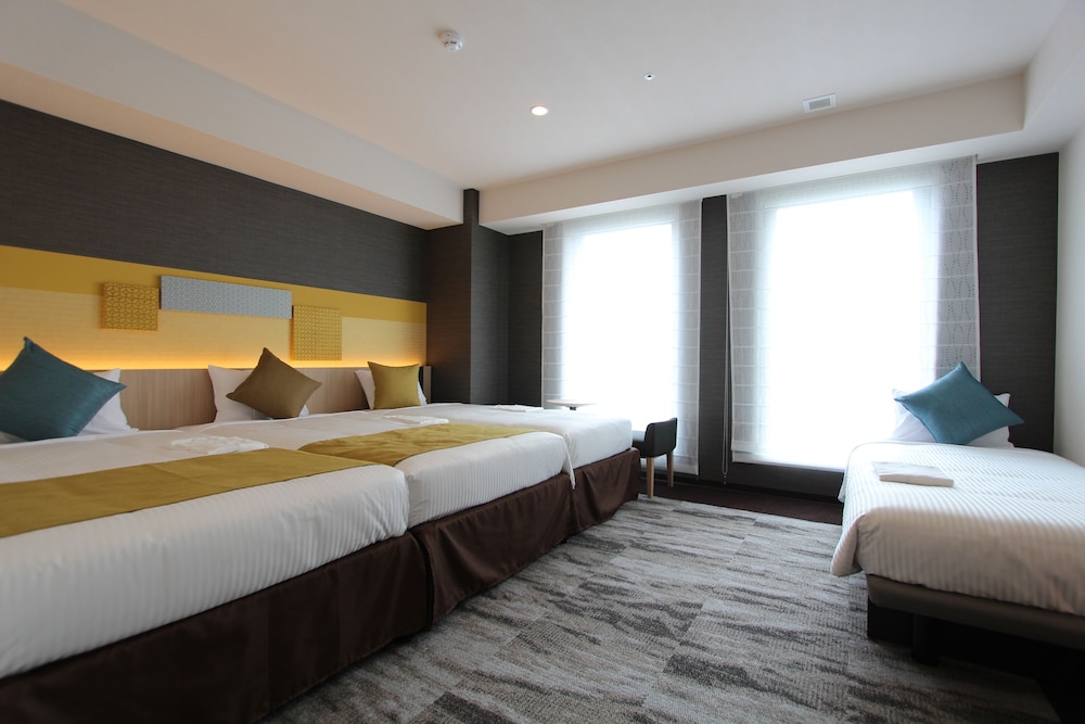Habitación familiar con 2 camas individuales, no fumadores del hotel KOKO Tsukiji Ginza. Foto 6