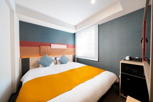 Habitación con cama extragrande. del hotel KOKO Tsukiji Ginza. Foto 1