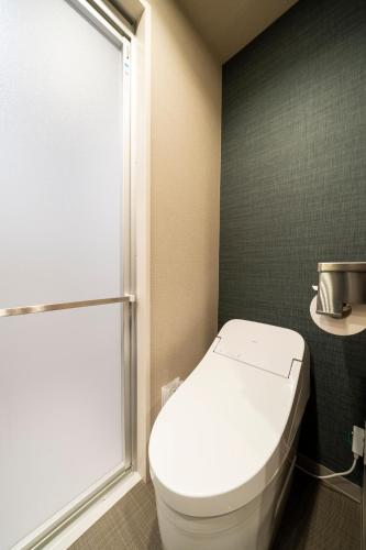 Habitación con cama extragrande. del hotel KOKO Tsukiji Ginza. Foto 6