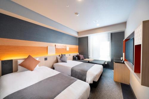 Habitación Doble Moderate con sofá cama - 2 camas del hotel KOKO Tsukiji Ginza. Foto 10