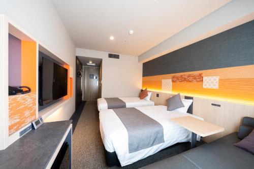 Habitación Doble Moderate con sofá cama - 2 camas del hotel KOKO Tsukiji Ginza. Foto 11