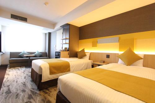 Habitación Doble Deluxe - 2 camas del hotel KOKO Tsukiji Ginza