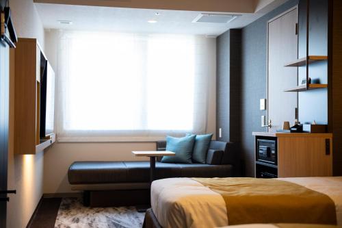 Habitación Doble Deluxe - 2 camas del hotel KOKO Tsukiji Ginza. Foto 8