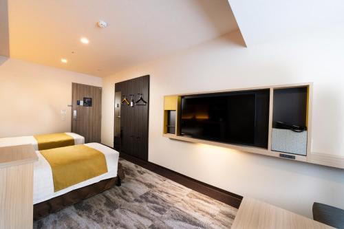 Habitación Doble Deluxe - 2 camas del hotel KOKO Tsukiji Ginza. Foto 9