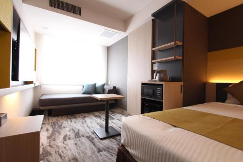 Habitación Doble Deluxe adaptada para personas con movilidad reducida - 2 camas del hotel KOKO Tsukiji Ginza. Foto 2