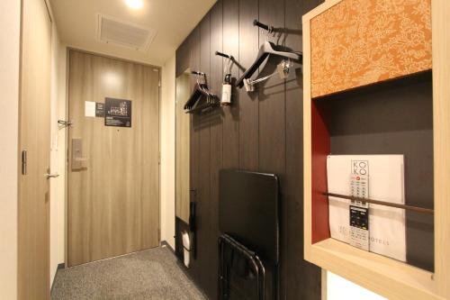 Habitación Doble Estándar - 2 camas del hotel KOKO Tsukiji Ginza. Foto 4