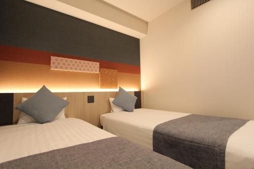 Habitación Doble Estándar - 2 camas del hotel KOKO Tsukiji Ginza. Foto 5