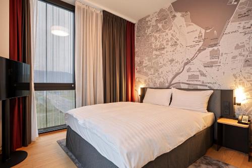 Habitación Doble Deluxe del hotel IntercityHotel Geneva. Foto 5