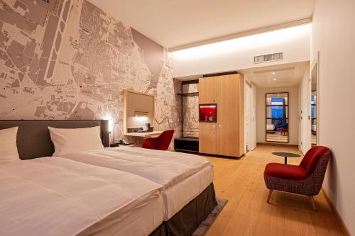 Habitación Doble adaptada para personas con movilidad reducida del hotel IntercityHotel Geneva. Foto 2