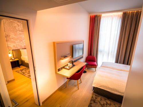Habitación Familiar del hotel IntercityHotel Geneva. Foto 2