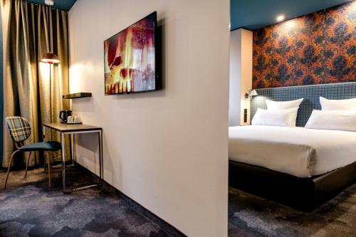 Habitación Doble Estándar con vistas a la ciudad del hotel Motel One Edinburgh - Princes. Foto 1