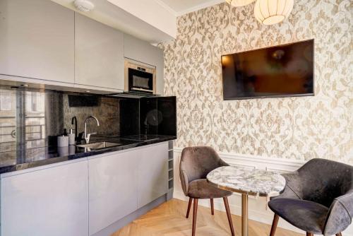 Apartamento Estudio con vistas a la ciudad - 44 del hotel Du Louvre - St-Honoré. Foto 5