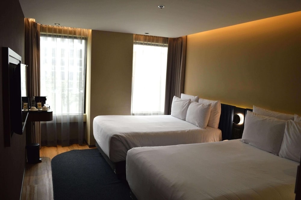 Habitación superior, 2 camas dobles, 23 metros cuadrados, 247 pies cuadrados del hotel Novotel México City Centro Histórico