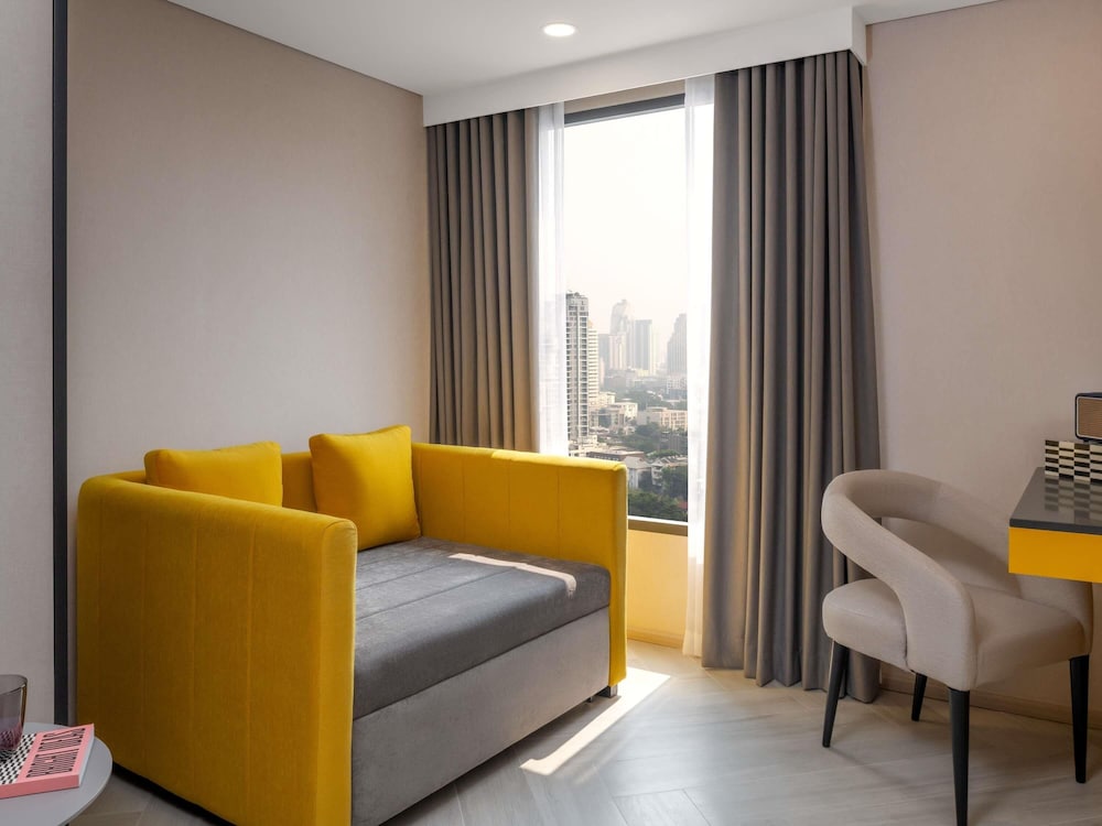 TRIBE Apartment Sofa Bed del hotel Tribe Living Bangkok Sukhumvit 39. Foto 6