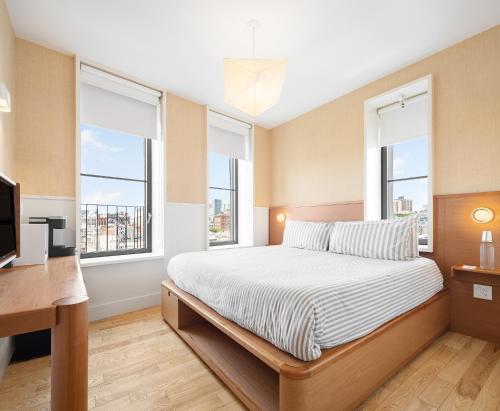 Alojamiento Untitled con cama extragrande del hotel Untitled at 3 Freeman Alley. Foto 1