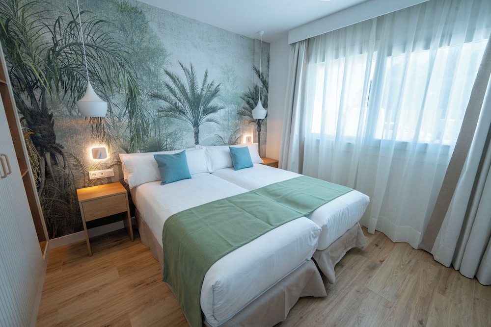 Apartamento Confort, 1 habitación, cocina, vistas al jardín del hotel Punta Candor Suites. Foto 1