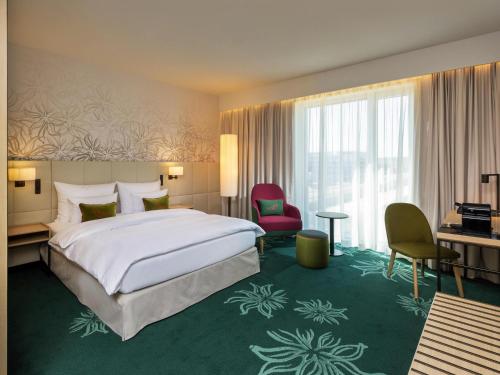 Habitación Superior - 1 cama grande del hotel Mövenpick Stuttgart Messe and Congress. Foto 3