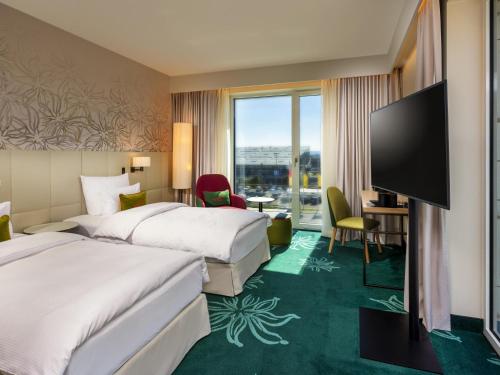 Habitación Doble Superior - 2 camas del hotel Mövenpick Stuttgart Messe and Congress. Foto 2