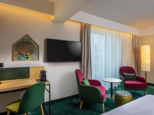 Habitación Individual Clásica del hotel Mövenpick Stuttgart Messe and Congress. Foto 1