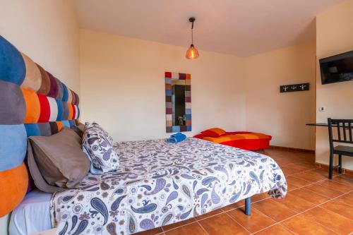 Suite con vistas al jardín del hotel Timanfaya Casa Rural. Foto 10