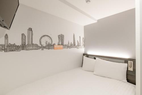 Habitación Doble Económica - Sin ventana del hotel easyHotel Victoria. Foto 8