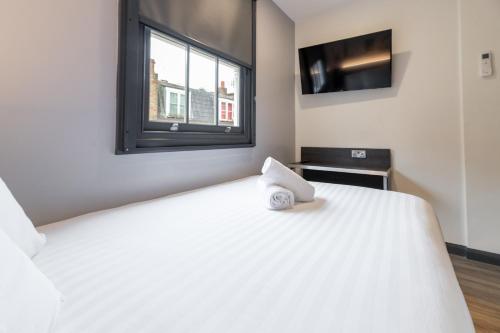 Habitación Familiar del hotel easyHotel Victoria. Foto 2