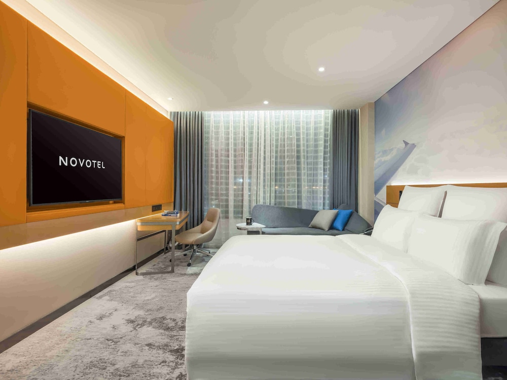 Habitación estándar con 2 camas individuales del hotel Novotel Guangzhou Baiyun Airport. Foto 3