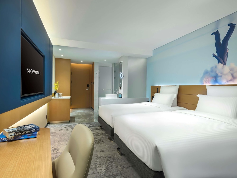 Habitación superior con 2 camas individuales del hotel Novotel Guangzhou Baiyun Airport