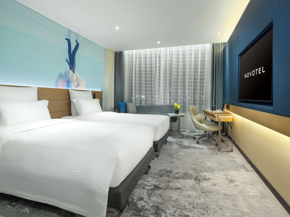 Habitación superior con 2 camas individuales del hotel Novotel Guangzhou Baiyun Airport. Foto 3