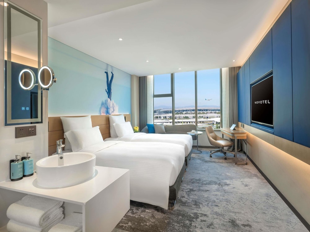 Habitación ejecutiva con 2 camas individuales Acceso al salón del hotel Novotel Guangzhou Baiyun Airport
